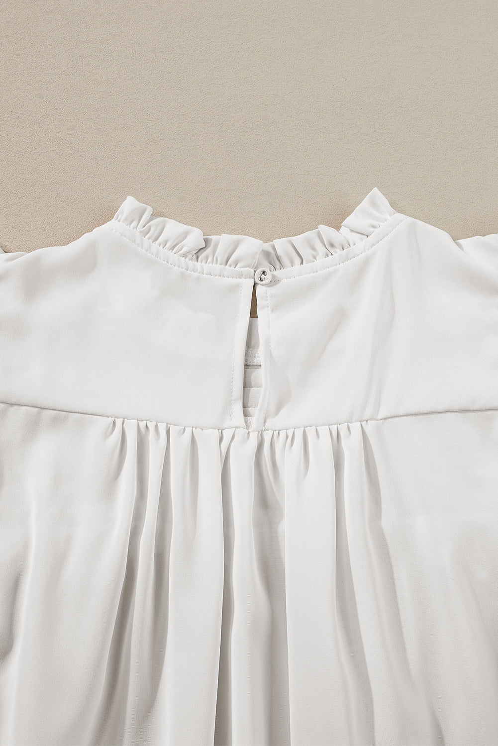 White Smocked Ruffle Sleeve Blouse